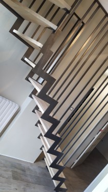 Escalier fer bois quart tournant / limon crémaillère / Finition fer brut patiné