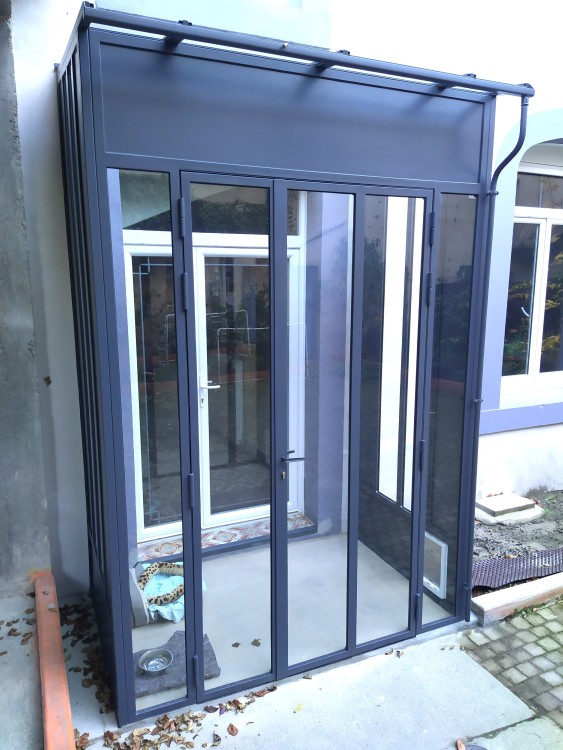 Verrière extérieure sas d'entrée /  Double porte battante / Finition thermolaquée